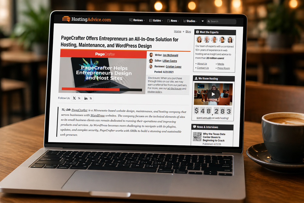 Laptop displaying a HostingAdvice.com article featuring PageCrafter’s WordPress hosting services and acquisition strategy